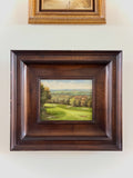 Golf course framed oil